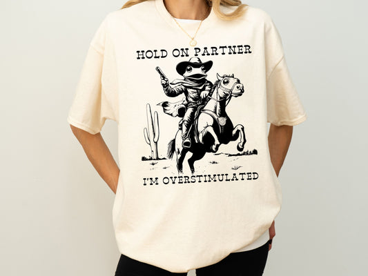 Hold On Partner I'm Overstimulated Shirt, Funny Frog T-Shirt, Cute Animal T-Shirt, Cowboy Frog Shirt, Cowboy Frog Riding A Horse T-Shirt